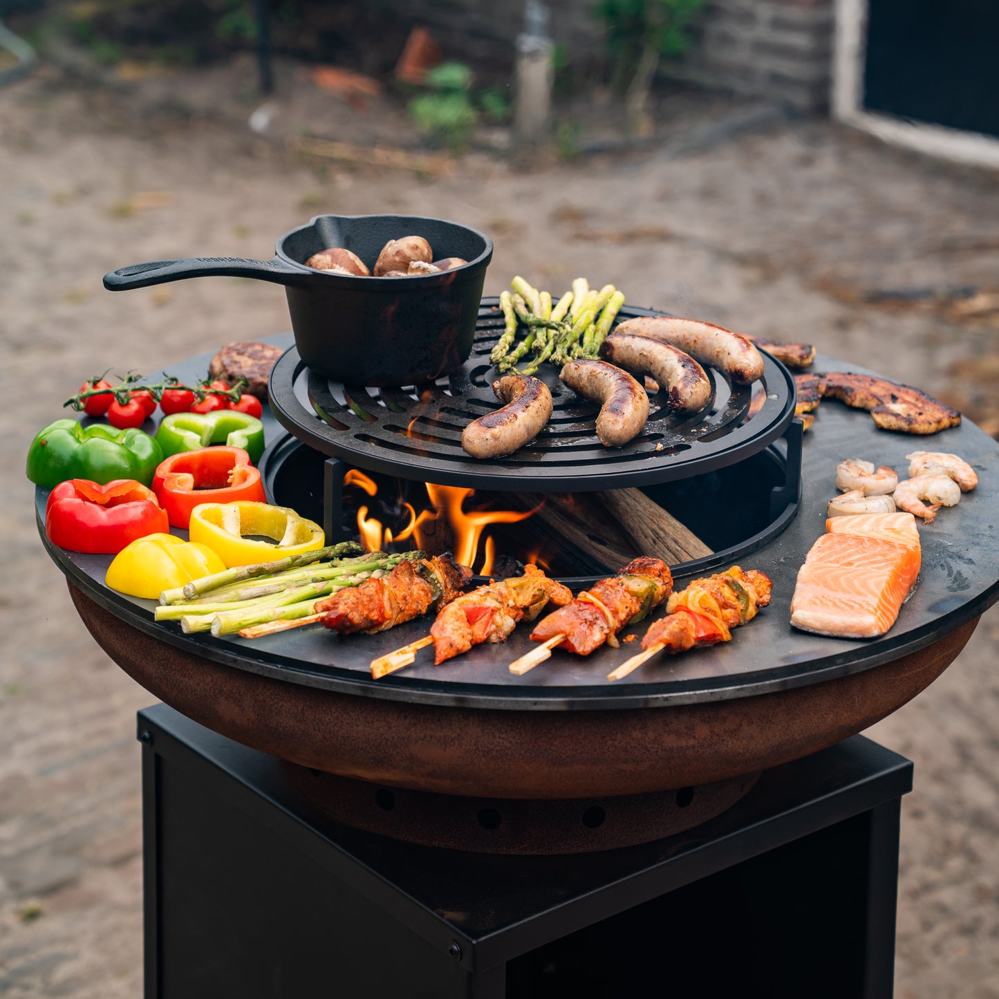 BBQ Plancha Grill Corten steel 8mm Camarada 2.0 - With poker and wood storage Ø70cm