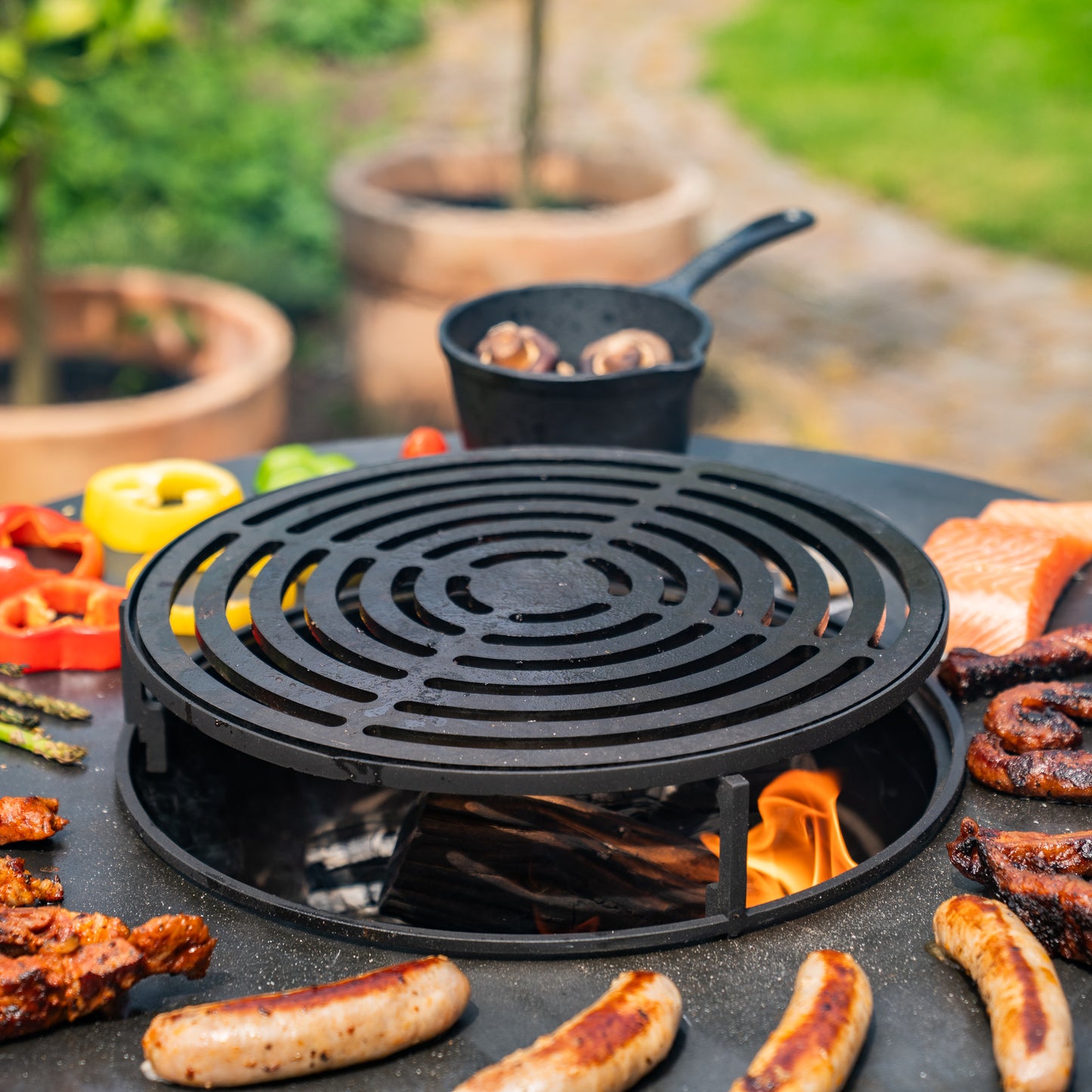 BBQ Plancha Grill Hermano XXL Corten steel - With poker and wood storage Ø80cm 8mm